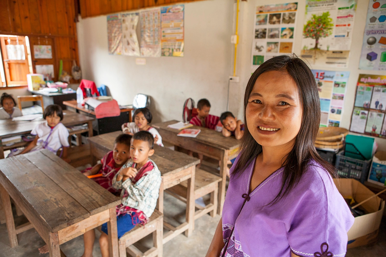 A teacher from a mountain village in Thailand participates in the Let's Read program.