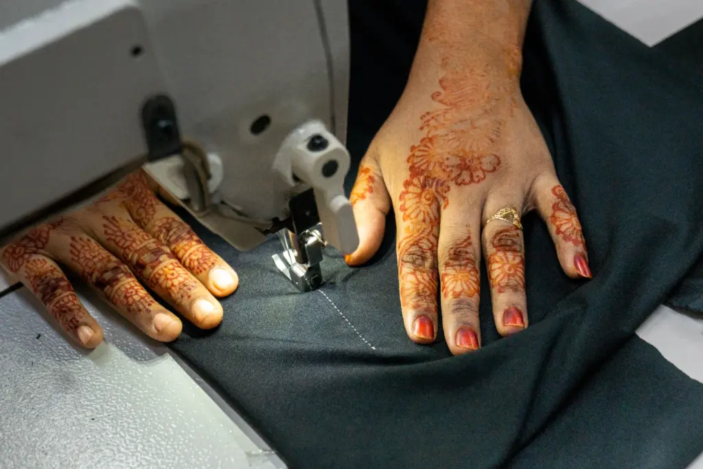 Hands with markings using a sewing machine