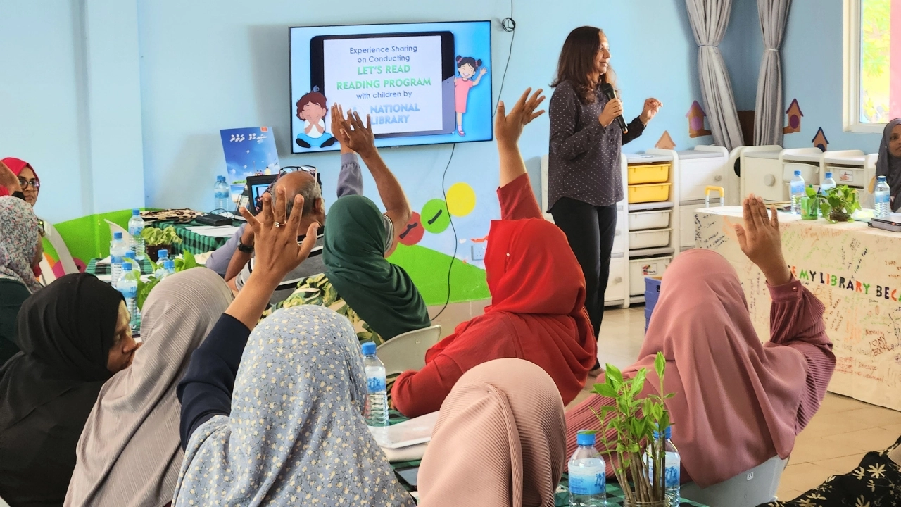 Community educators participate in the Let’s Read program—sharing stories and techniques to bring reading to children across the Maldives.