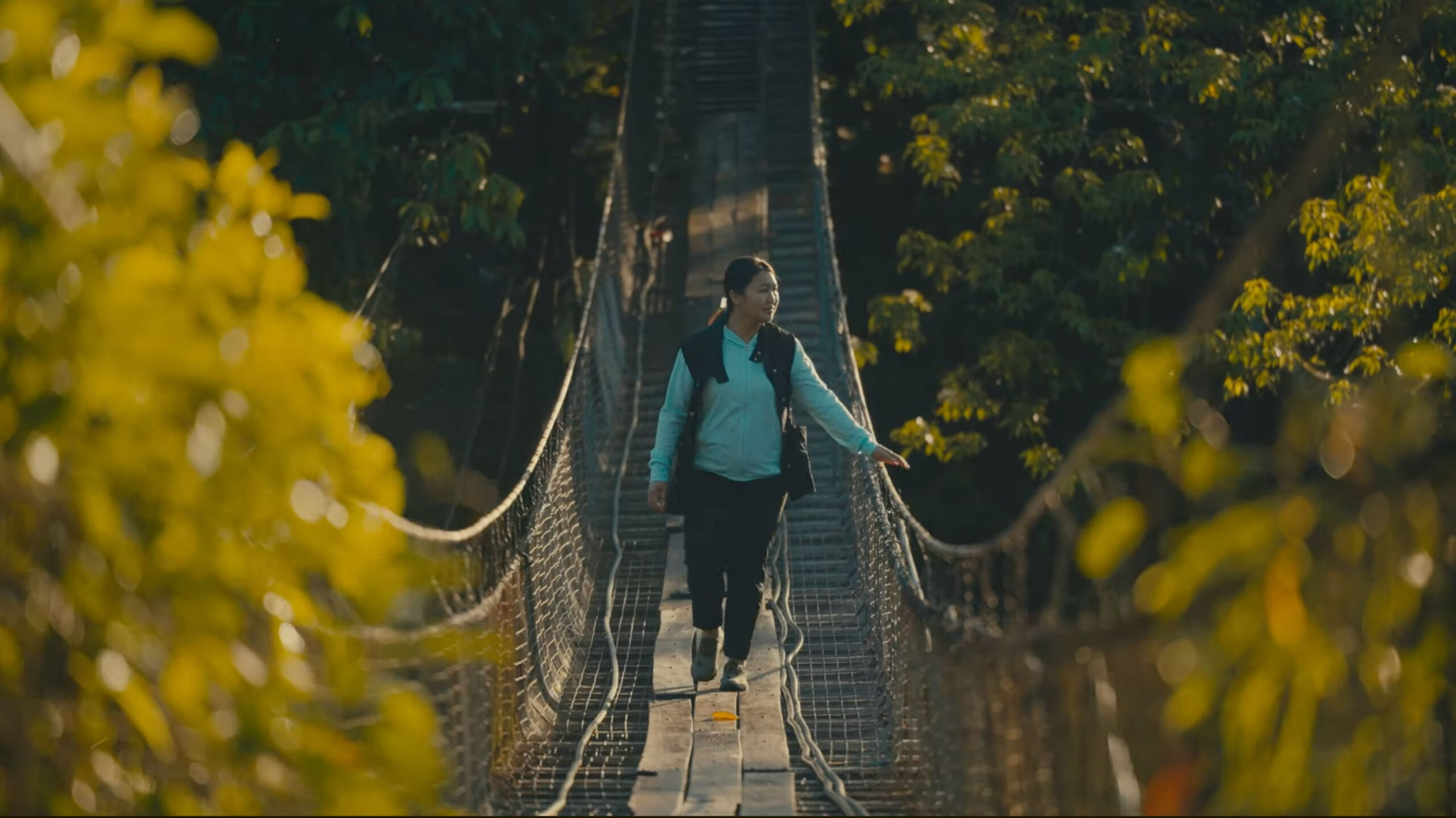 Beverley, Damai Avenues Eco Park, from Striver's Hub walking on rope bridge